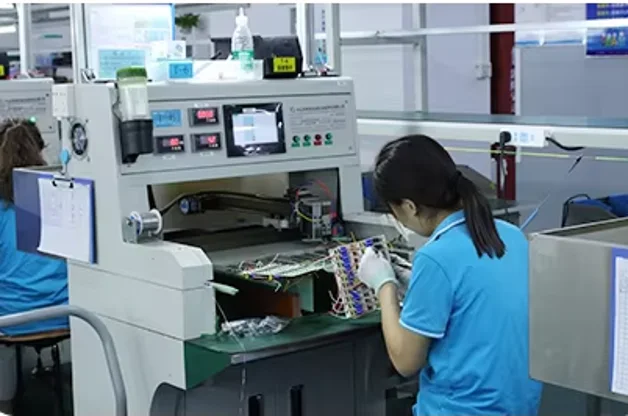 Gerixi technician testing solar power electronics